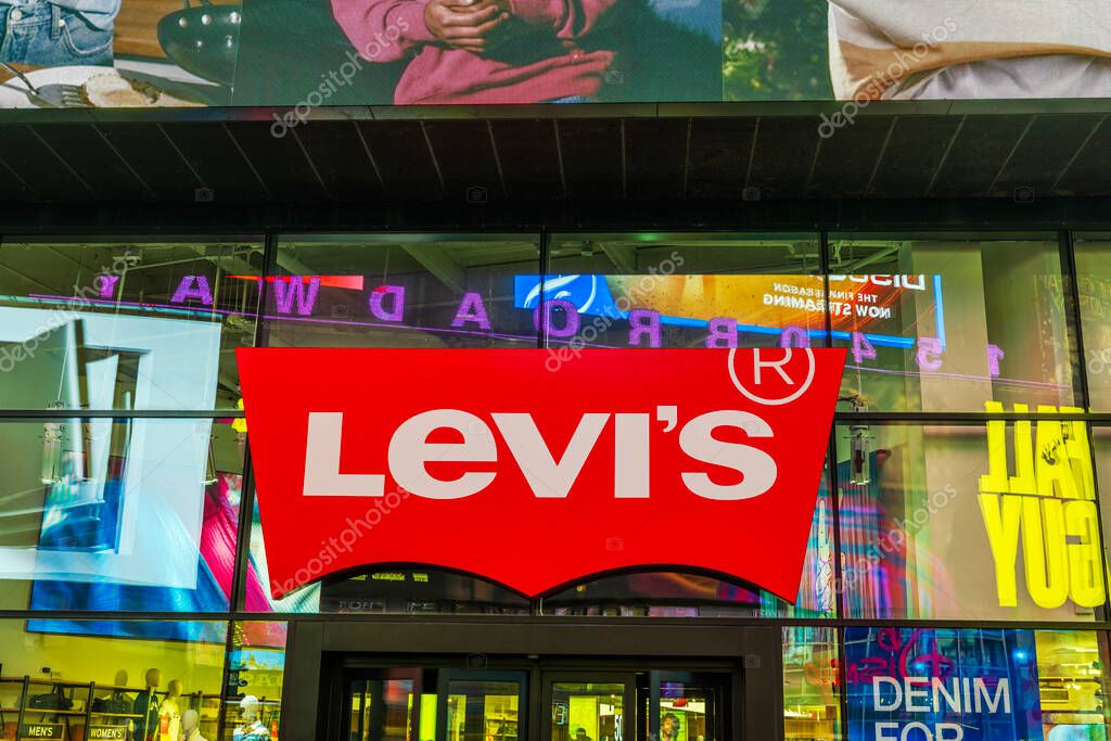 Night view of the Levi's store at Times Square, Broadway, with the address 1540 Broadway displayed in the store windows. New York. USA.