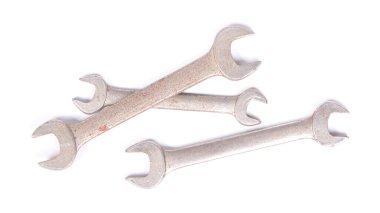 Old hand tools, old wrenches on a white background