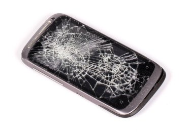Broken display screen smartphone on a white background