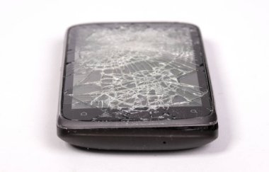 Broken display screen smartphone on a white background
