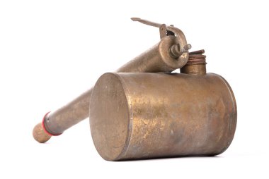 Old brass insecticide spray on a white background