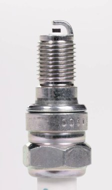 Spark plug isolated (with clipping path) on white