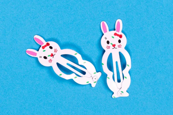 stock image Bunny hairclips for girl, isolated on a blue background