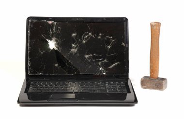 Old broken laptop isolated on white a background, broken with hammer clipart
