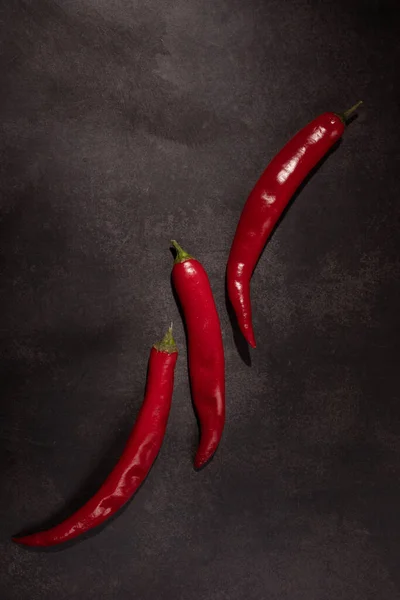 Group Red Peppers Black Background — Stock Photo, Image