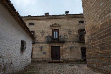 BAEZA, SPAIN - DECEMBER 6, 2022: Palace of Rubin Ceballos, in the old town of the city of Baeza, province of Jaen, Spain. This noble and well carved building, dated 1804, is a good example of Baeza's neoclassicism.