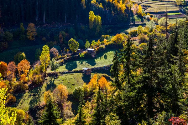 stock image Autumn view in Savsat. Artvin, Turkey. Beautiful autumn landscape with wooden house. Colorful fall nature view