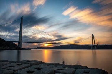 Yavuz Sultan Selim Bridge in Istanbul, Turkey. 3rd bridge of Istanbul Bosphorus with blue sky. Sunset view