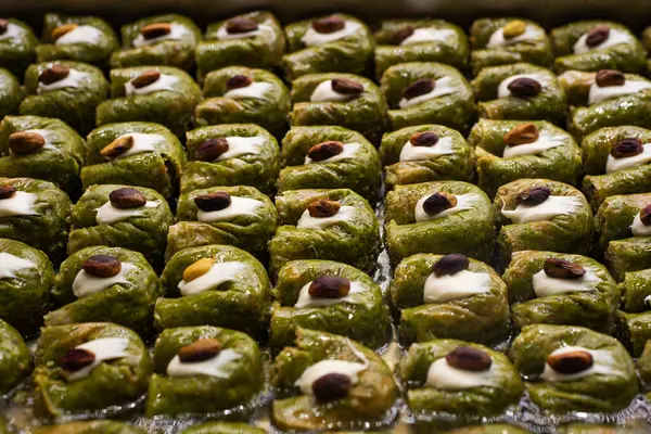 Turkish sweet baklava on tray. Traditional Baklava from Gaziantep, Turkey. Baklava with pistachio.
