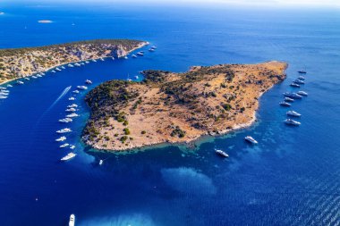 Turkbuku Bay of Bodrum. Mugla, Turkey. Aerial panoramic view of Turkbuku (Golturkbuku). Big Island. Drone shot. clipart