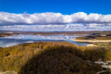 Omerli Dam is a dam in Istanbul, Turkey. Omerli Dam is located in Cekmekoy district. Aerial drone shot. clipart