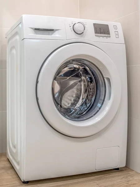 White washing machine in the laundry room