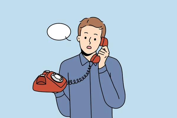Stunned Young Man Talking Landline Phone Amazed Male Speech Bubble — Stock Vector