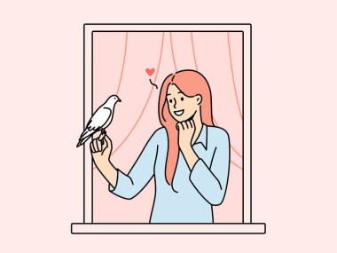 Smiling woman in house window holding pigeon in hands. Girl in love sending love letter with bird. Vector illustration.  clipart