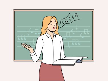 Kadın vokalist notalarla tahtaya yakın durup öğrencilerin sesini geliştirmesine yardım ediyor. Kız dergi tutuyor ve profesyonel vokalist ya da besteci olmak için şarkı söylüyor.