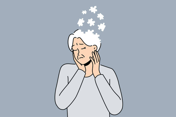 Elderly woman suffers from dementia and memory loss and is in need of specialized caregivers. Sad female pensioner is sick with dementia due to advancing age or lot of psychological stress in youth