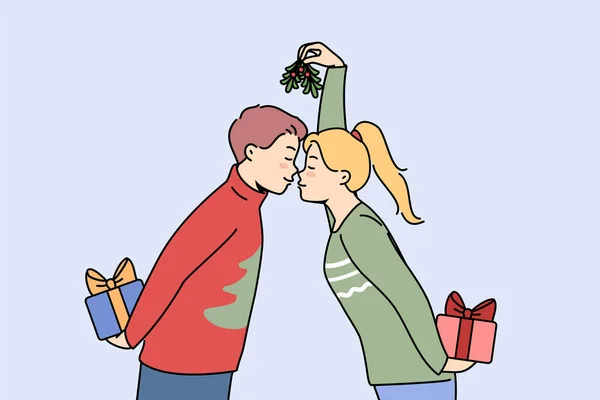 Couple Noël Avec Coffrets Cadeaux Embrasse Tient Des Cônes Sapin — Image vectorielle