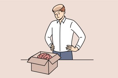Adam beyni kafasından çıkarıp karton kutuya koydu, hafızadan gerçekleri silmek için. Aptal adam daha zeki olmak ve yeni yetenekler kazanmak için yeni bir beyin aldı.