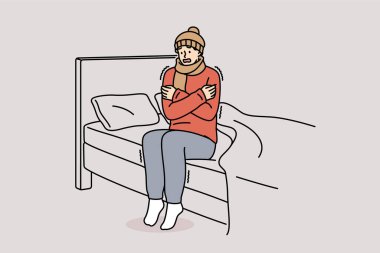 Donmuş adam titriyor. Yatakta oturuyor, üşümüş ve üşüyor. Şapka ve eşarp takmış. Donan adam merkezi ısıtma sistemi eksikliği ve yatak odasında bulunan zayıf bağışıklık sistemi yüzünden acı çekiyor.