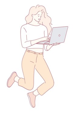 Neşeli bir kadının enerjik bir şekilde dizüstü bilgisayarını kullanarak yaratıcılık ve teknoloji sergilemesinin canlı bir örneği.