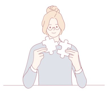 Bir kadın, renkli yapboz parçaları, takım çalışmasını ve bağlantıyı sembolize ederek sorunlu çözme yeteneklerini ustalıkla gösterir.