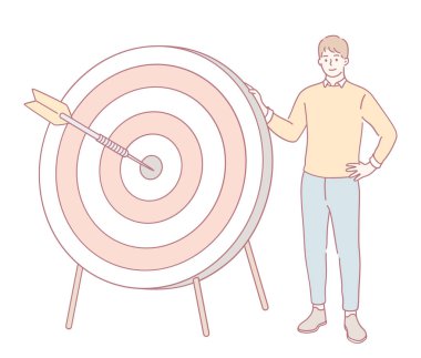 Hedefi olan bir kişinin tasviri, hedef belirleme ve açık hırslarla başarıyı simgeliyor.