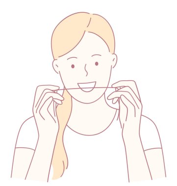 Sağlıklı ağız hijyenini korumak için uygun diş ipi tekniğini gösteren bir kadın.