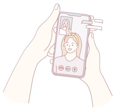 Bu, modern dijital etkileşimin özünü gösteren canlı bir video çağrısını tasvir eden bir el yazısı.