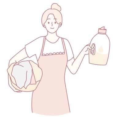 Önlük takan bir kadının çamaşır deterjanıyla birlikte ev işlerinin özünü temsil ettiği görülüyor.