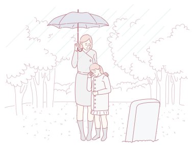 Sevgi dolu bir anne ve kızı arasında mezarlıkta sevgi ve hatıra dolu bir an.