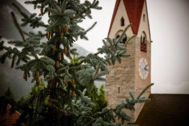 Ancient church in a mountain scenario in Sud Tirol  clipart