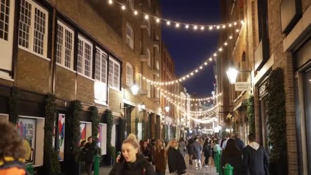 Лондон Великобритания 2022 Рождественские Огни Украшенные Улицы Ковент Гарден — стоковое видео
