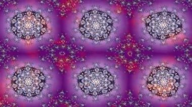 Renkli unsurlarla hareketli arka plan görüntüleri. Mandalas. Eski model. Video kaydı. Şablon.