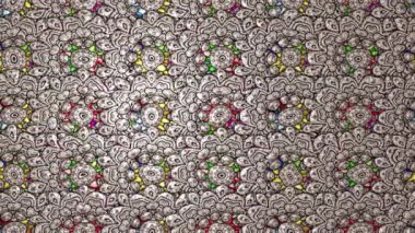 Renkli unsurlarla hareketli arka plan görüntüleri. Çiçekler. Eski model. Bayrak tarzı. Video kaydı. Şablon. Döngü. Kusursuz..