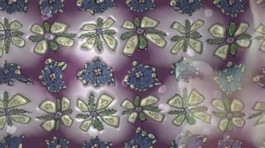 Renkli unsurlarla hareketli arka plan görüntüleri. Çiçekler. Eski model. Bayrak tarzı. Video kaydı. Şablon. Döngü. Kusursuz..