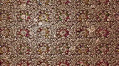 Renkli unsurlarla hareketli arka plan görüntüleri. Çiçekler. Eski model. Bayrak tarzı. Video kaydı. Şablon. Döngü. Kusursuz..