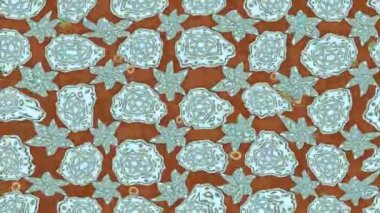 Renkli unsurlarla hareketli arka plan görüntüleri. Çiçekler. Eski model. Bayrak tarzı. Video kaydı. Şablon. Döngü. Kusursuz..