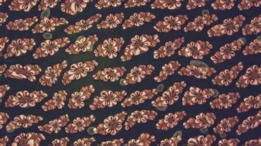 Renkli unsurlarla hareketli arka plan görüntüleri. Çiçekler. Eski model. Bayrak tarzı. Video kaydı. Şablon. Döngü. Kusursuz..