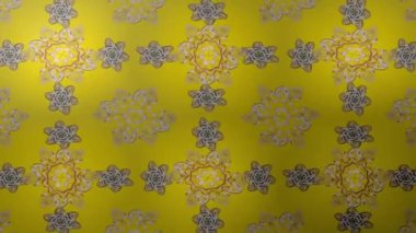 Renkli unsurlarla hareketli arka plan görüntüleri. Çiçekler. Eski model. Bayrak tarzı. Video kaydı. Şablon. Döngü. Kusursuz..