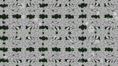 Renkli unsurlarla hareketli arka plan görüntüleri. Çiçekler. Eski model. Bayrak tarzı. Video kaydı. Şablon. Döngü. Kusursuz..