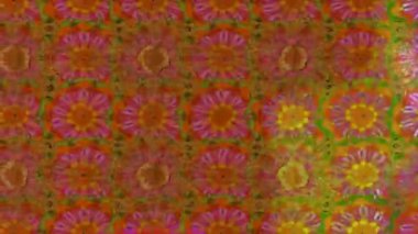 Renkli unsurlarla hareketli arka plan görüntüleri. Çiçekler. Eski model. Bayrak tarzı. Video kaydı. Şablon. Döngü. Kusursuz.. 