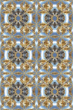 Furniture in classic style. Small depth of field. Luxury furniture. Seamless element woodcarving. Pattern on gray, blue colors with golden elements. Gray, neutral and blue backdrop with gold trim.