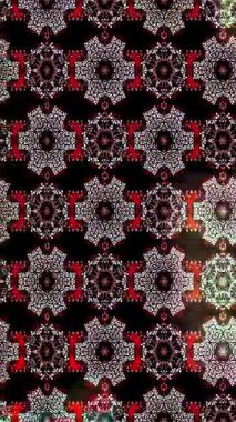 Renkli unsurlarla hareketli arka plan görüntüleri. Çiçekler. Eski model. Bayrak tarzı. Video kaydı. Şablon. Döngü. Kusursuz.. 