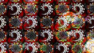 Renkli unsurlarla hareketli arka plan görüntüleri. Çiçekler. Eski model. Bayrak tarzı. Video kaydı. Şablon. Döngü. Kusursuz.. 