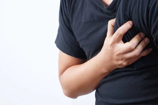 stock image Man having chest pain - heart attack outdoors. or Heavy exercise causes the body to shocks heart disease	