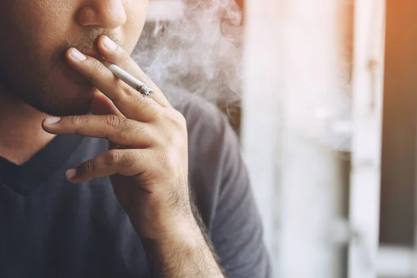 Man Holding Smoking Cigarette Hand Cigarette Smoke Spread Dark Background — Stock Photo, Image