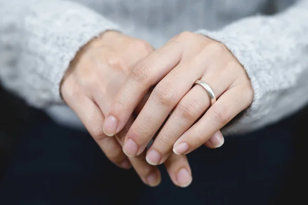 married wed couple holds hands and shows off her wedding rings. lover valentine day concept.