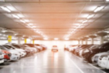 Concept sheet label write text.Cars parked in the parking lot.Open space area indoors.	