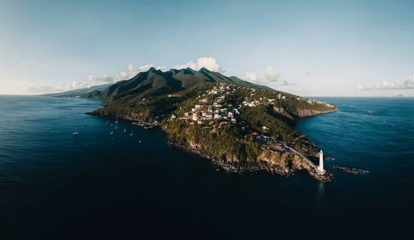 Aerial drone panorama of Lighthouse at Vieux-Fort, the southernmost point of Guadeloupe, Caribbean Sea.