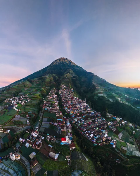 Stock image Aerial View The Beauty Of Building Houses In The Countryside Of The Mountainside In The Morning. Nepal van Java Is A Rural Tour On The Slopes Of Mount Sumbing, Central Java